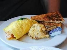 A delicious plate of food served at River Street Inn