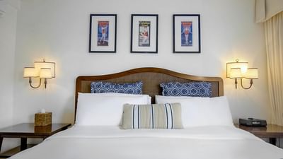 Nightstands by the cozy bed in Superior King Room at Pavilion Hotel
