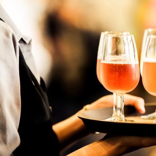 Expert hospitality from waitress at Villiers Hotel, a top Engagement Party Venue in Buckingham