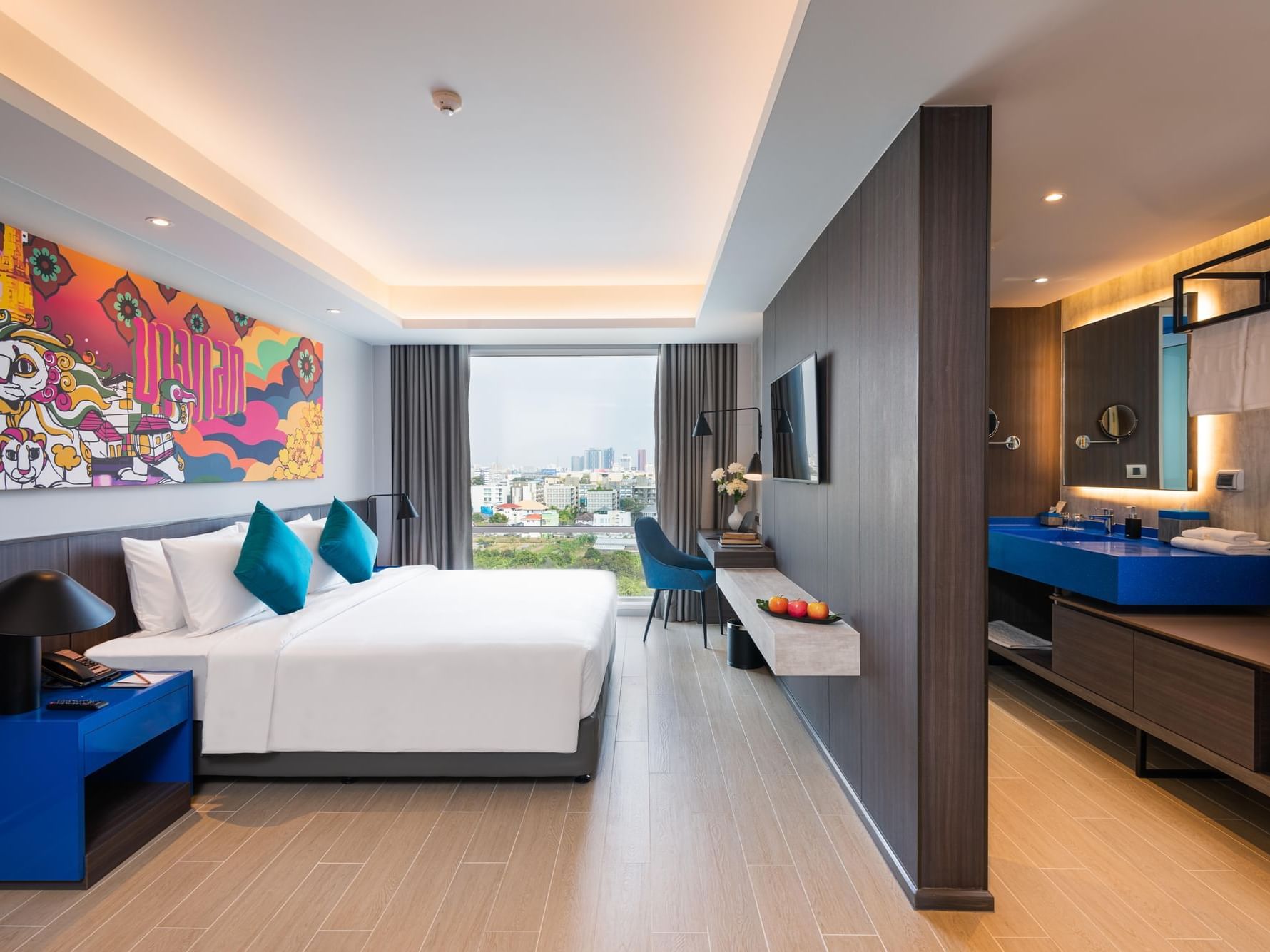 King bed in the Grand Deluxe Room at Maitria Hotel Rama 9