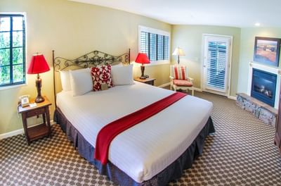 Large Suite bedroom with king bed and fireplace