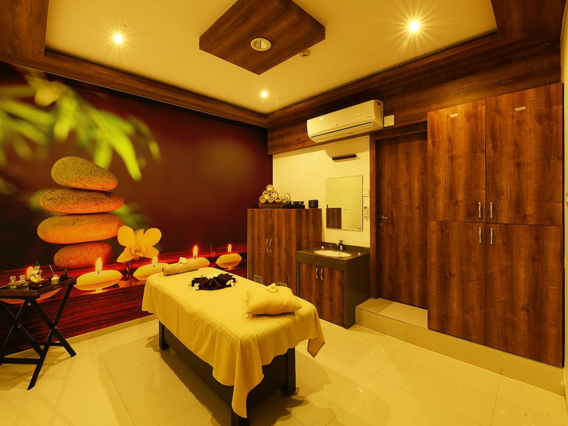 Spa bed and amenities in U Spa with wooden interior at Eastin Easy Vita