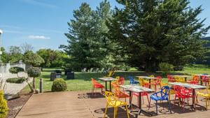 Outdoor dining area at Hotel Beausejour, The Originals Hotels