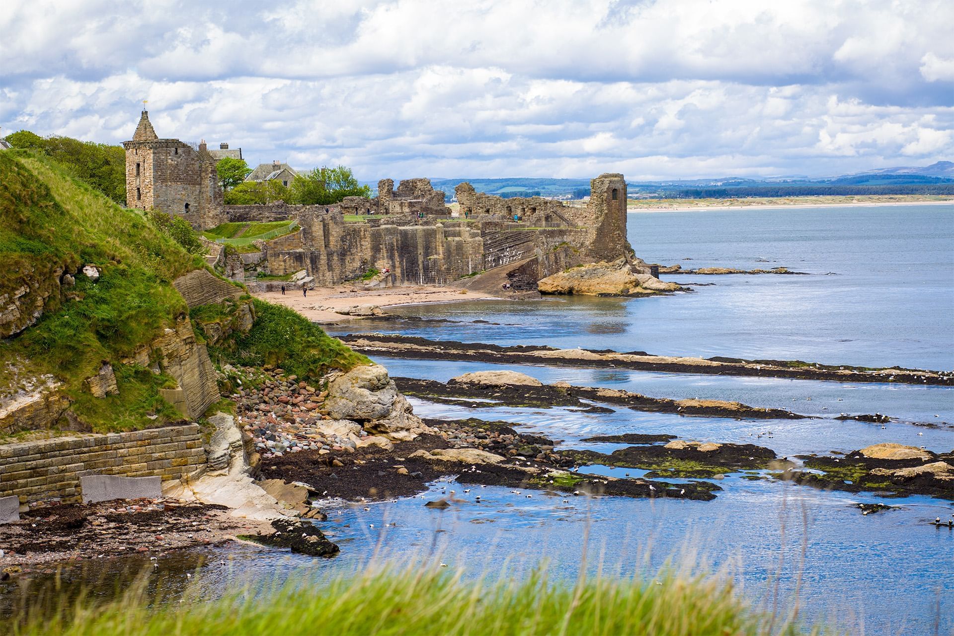 St Andrews Castle by the sea with a rocky shoreline near Hotels Fife Scotland