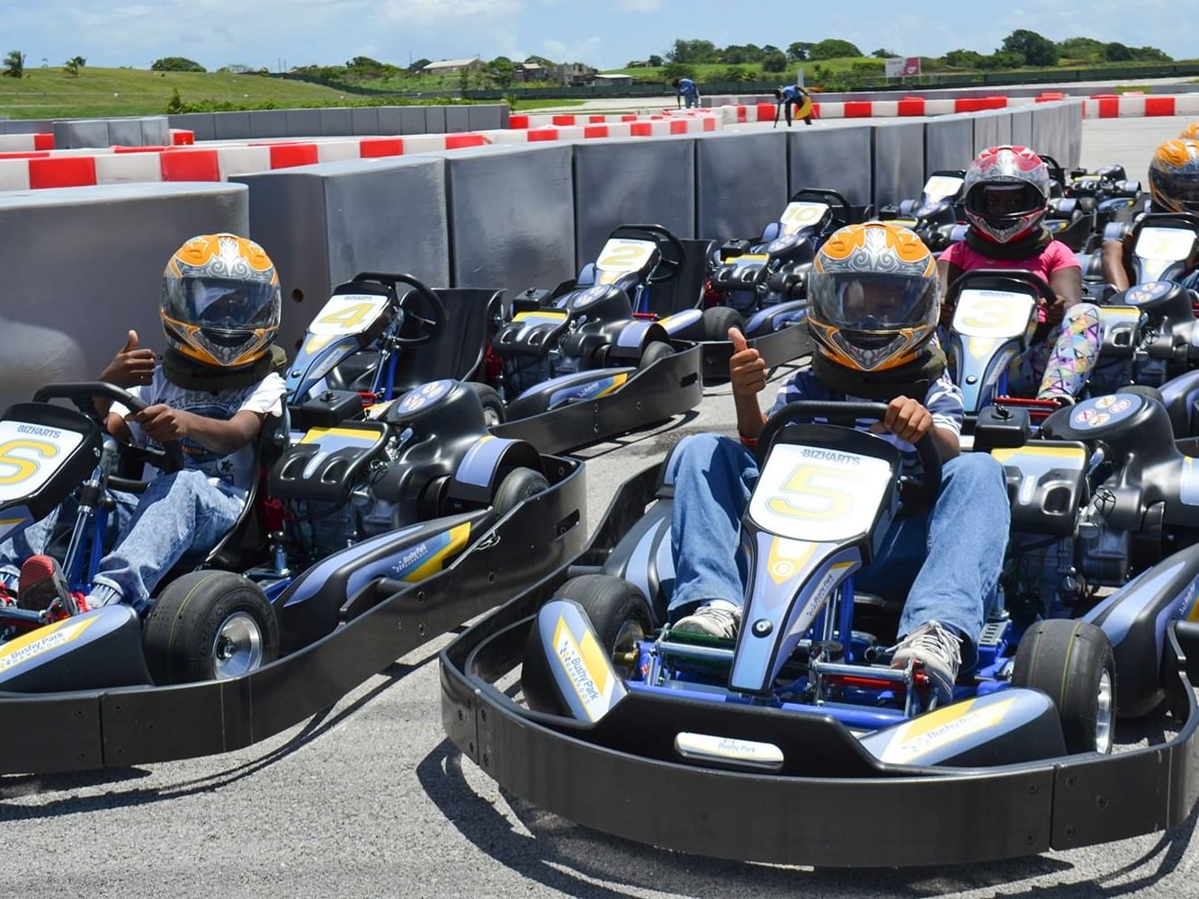 Group of Kids racing go karts near Bougainvillea Barbados