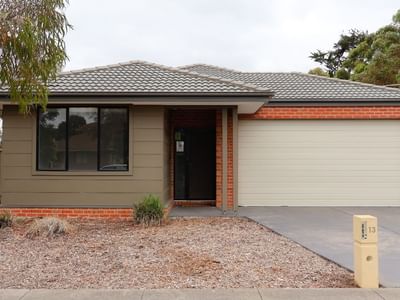 Front view of La Trobe University Regional Housing - Ballarat with garage and driveway.