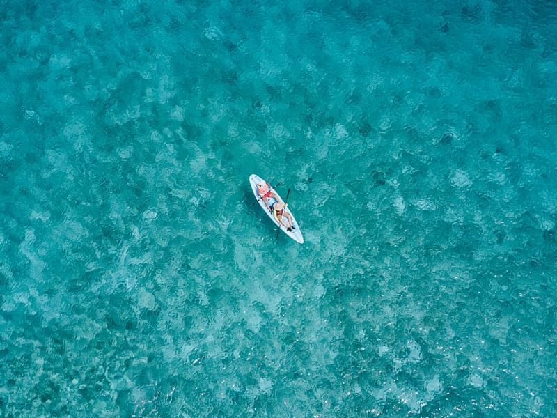 Aerial view of a couple on a Kayak near La Colección Resorts