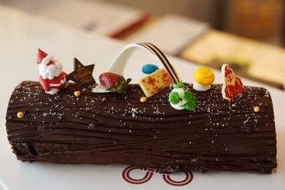 Close-up of Christmas log cake at Hanoi Daewoo Hotel