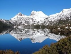 Distant view of Cradle Mountain by a lake near Hotel Grand Chancellor Launceston