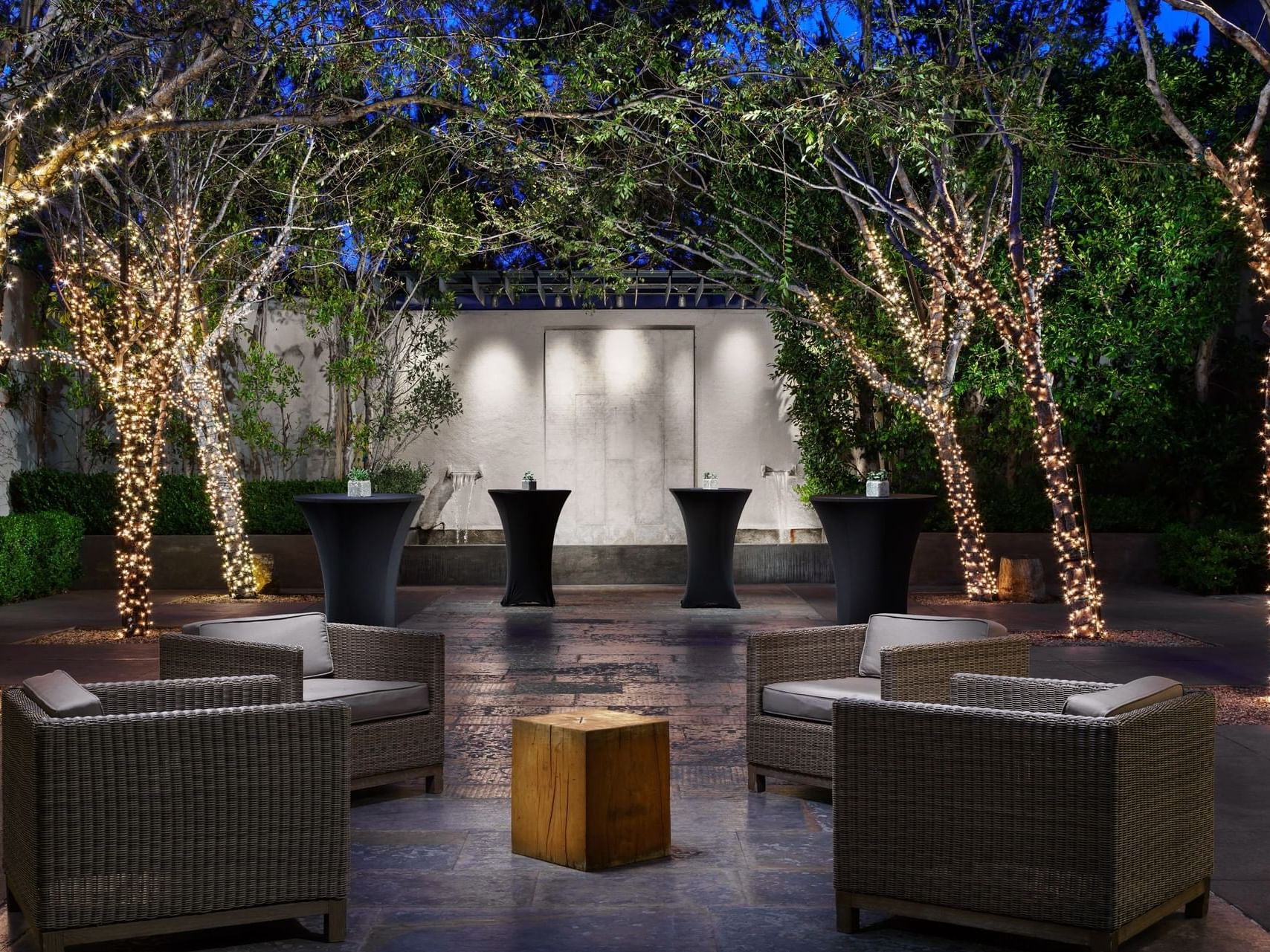 Comfy sofa set on outside for meeting at Luxe Sunset Boulevard