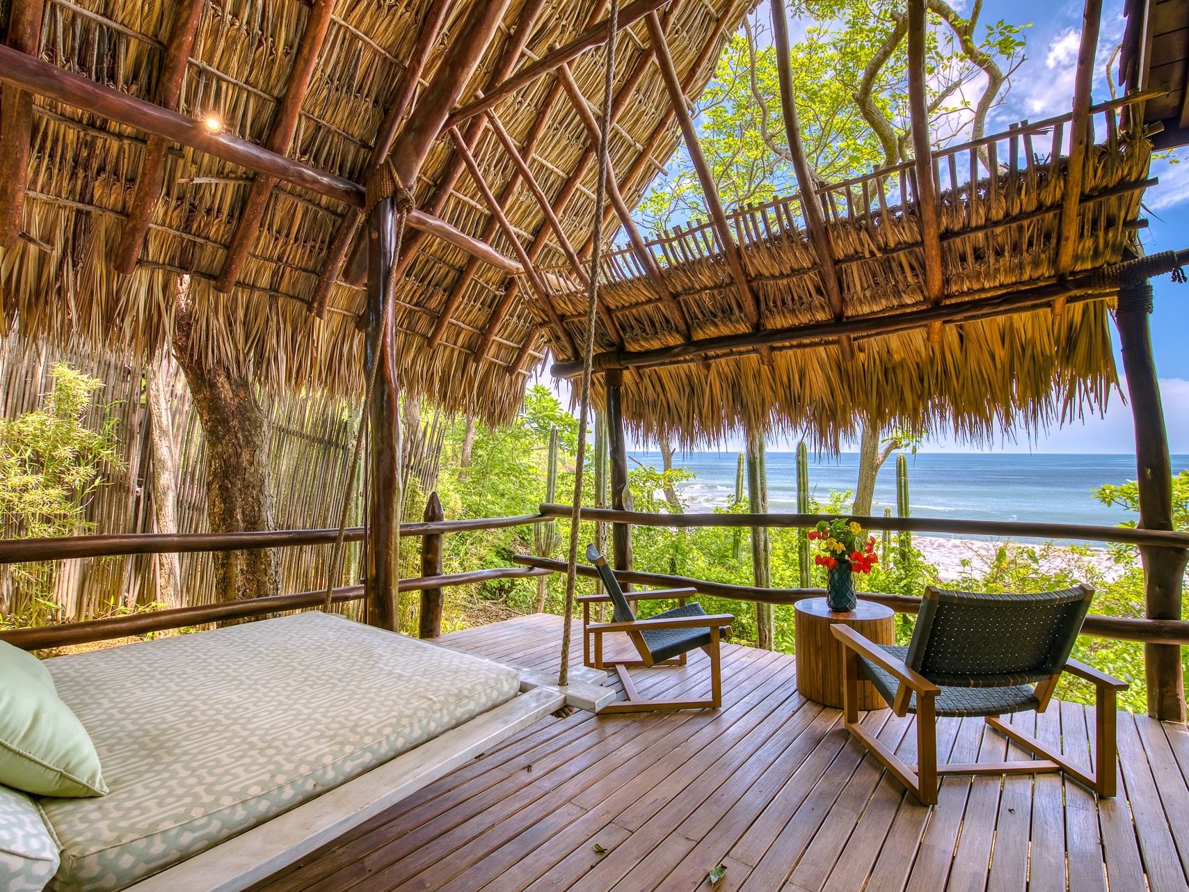 Ocean View Bungalows with Private Plunge Pool featuring a large daybed at Morgan's Rock Reserve & Ecolodge
