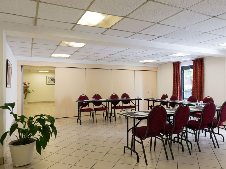 U shaped meeting tables set up at Hotel Paris Sud