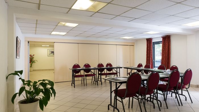 U shaped meeting tables set up at Hotel Paris Sud