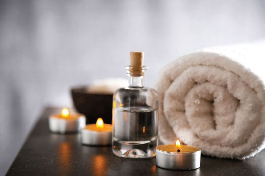 Towel, oil & candle in J House Spa at J House Greenwich