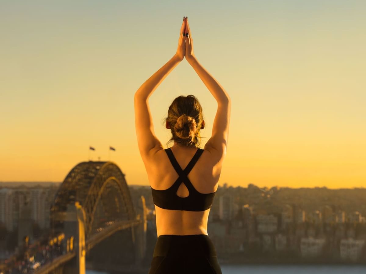 Practicing Yoga at The Sebel Quay West Suites Sydney