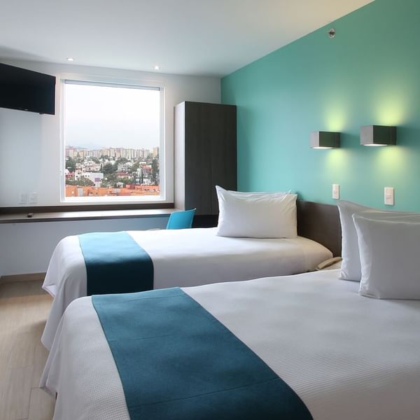 Twin beds in Standard Twin Room at One Hotels