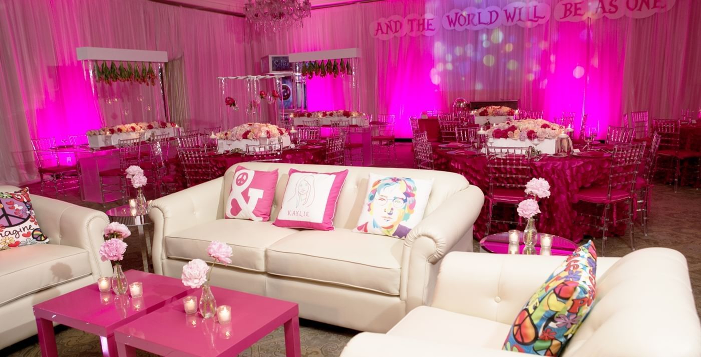 Sofas & tables at an event with pink lighting, Townsend Hotel