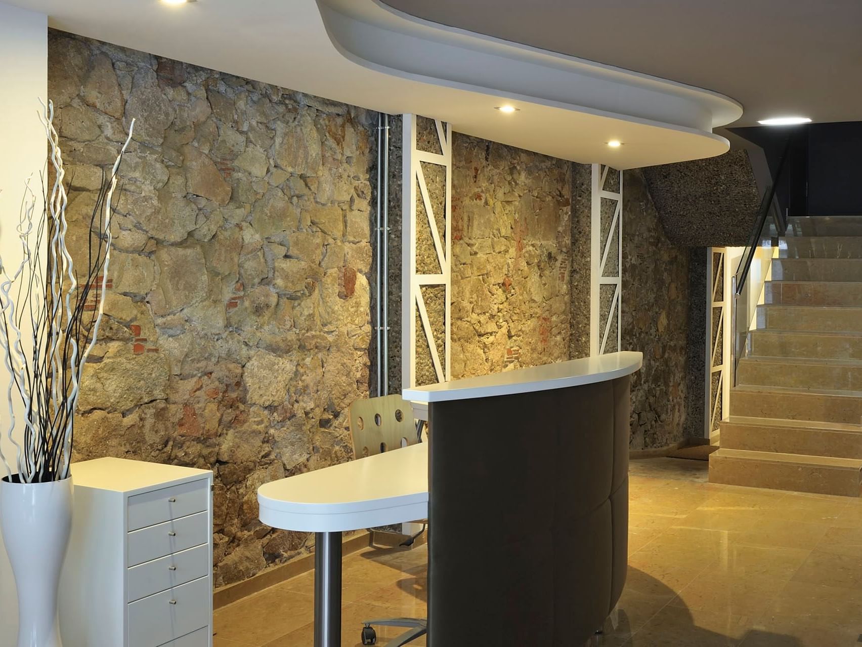 A stairway by the Reception desk at Barcelona Apartment