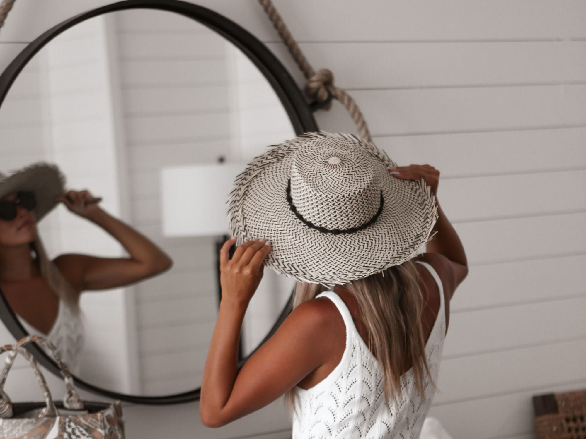 guest looking in the mirror