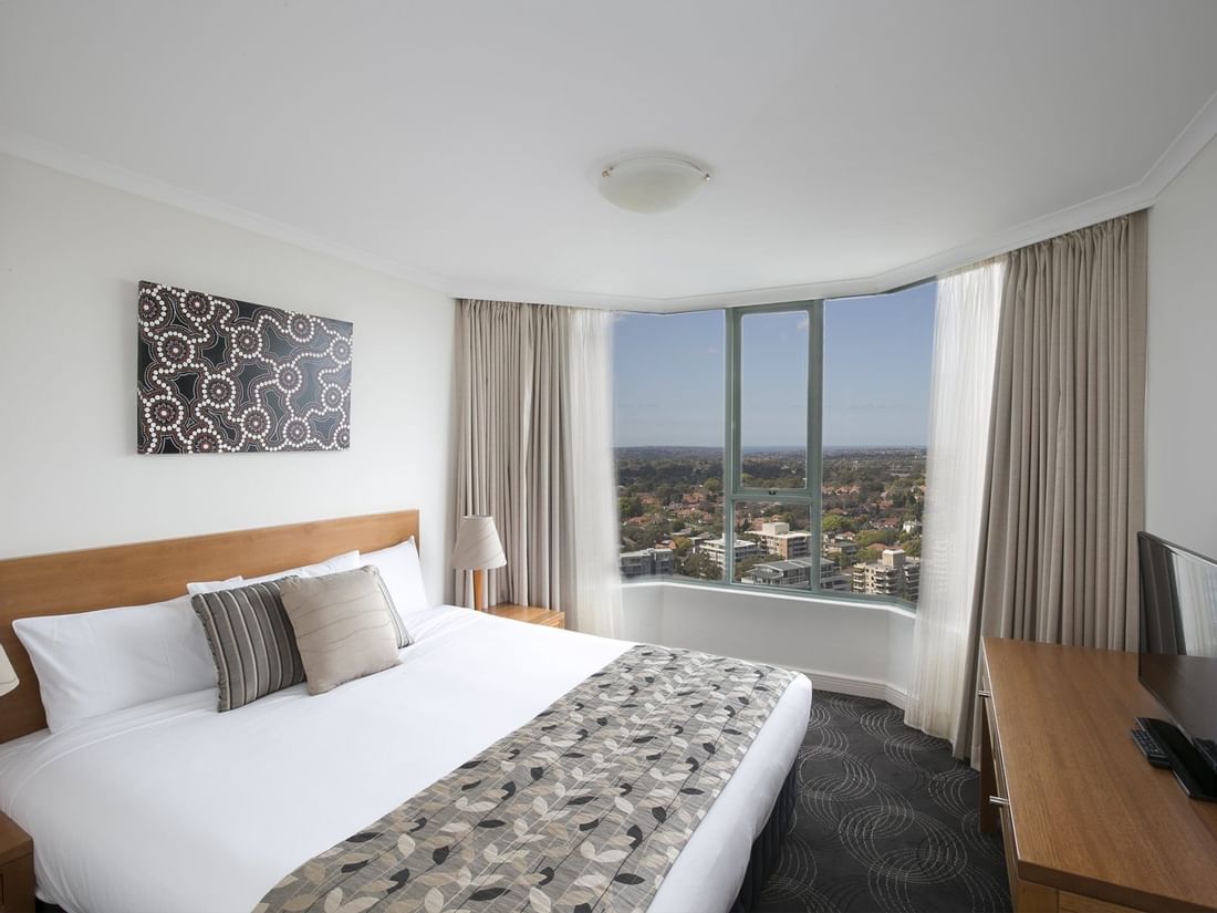 Comfortable bed room with  out door view  at the Sebel Residence Chatswood