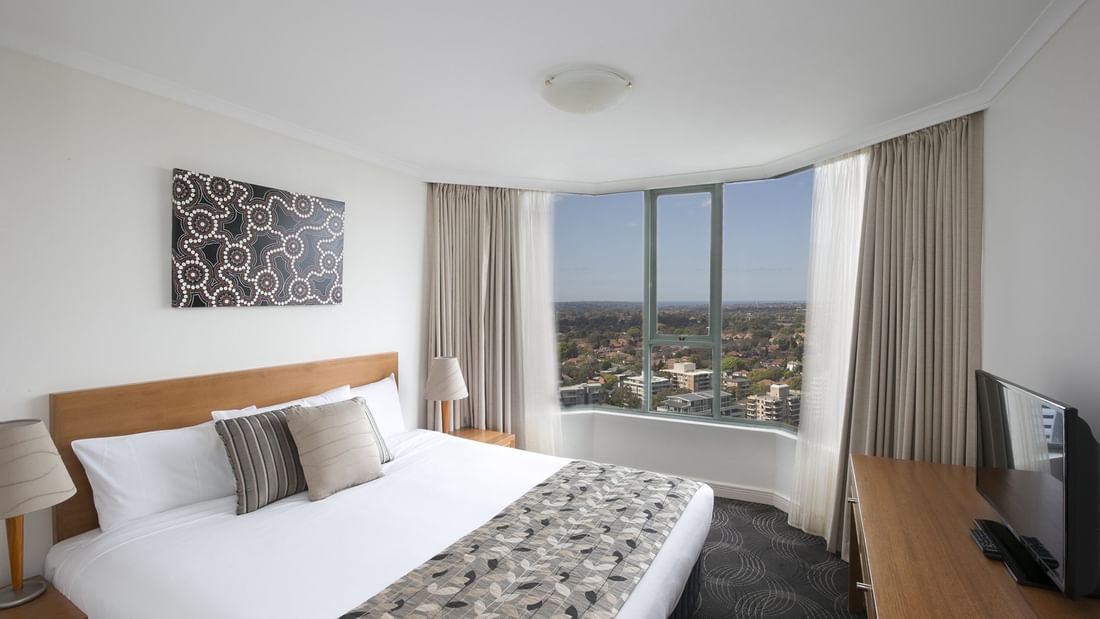 Comfortable bed room with  out door view  at the Sebel Residence Chatswood