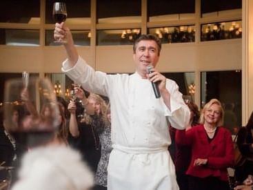 A man announcing at the Boston wine fest