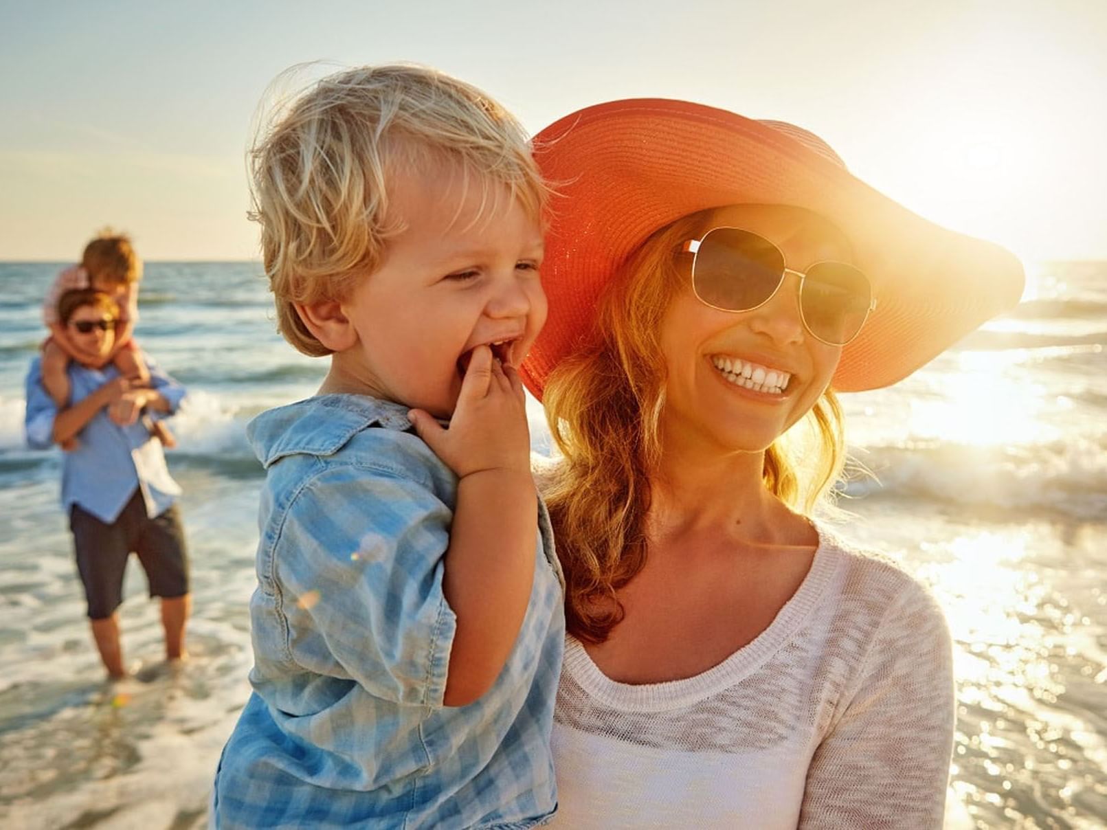 Mother and child enjoying a sunny day at the beach in SeaCrest Oceanfront Hotel Pismo Beach