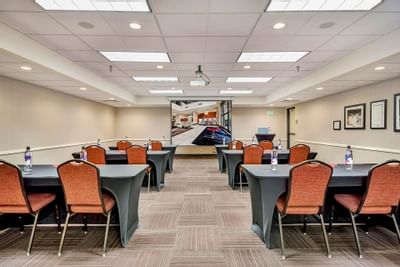 large conference room with projector & screen at Hotel 43