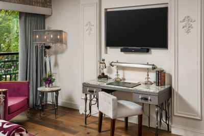 living room with television and window