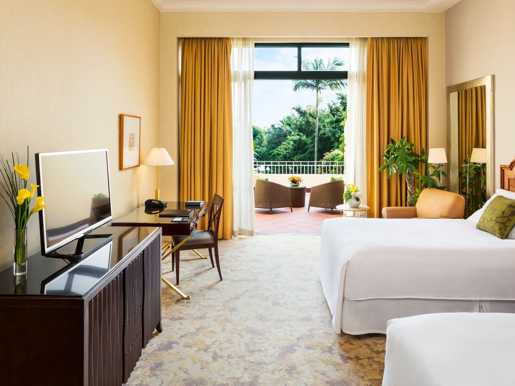 Twin beds & lounger in Superior Room at Grand Coloane Resort