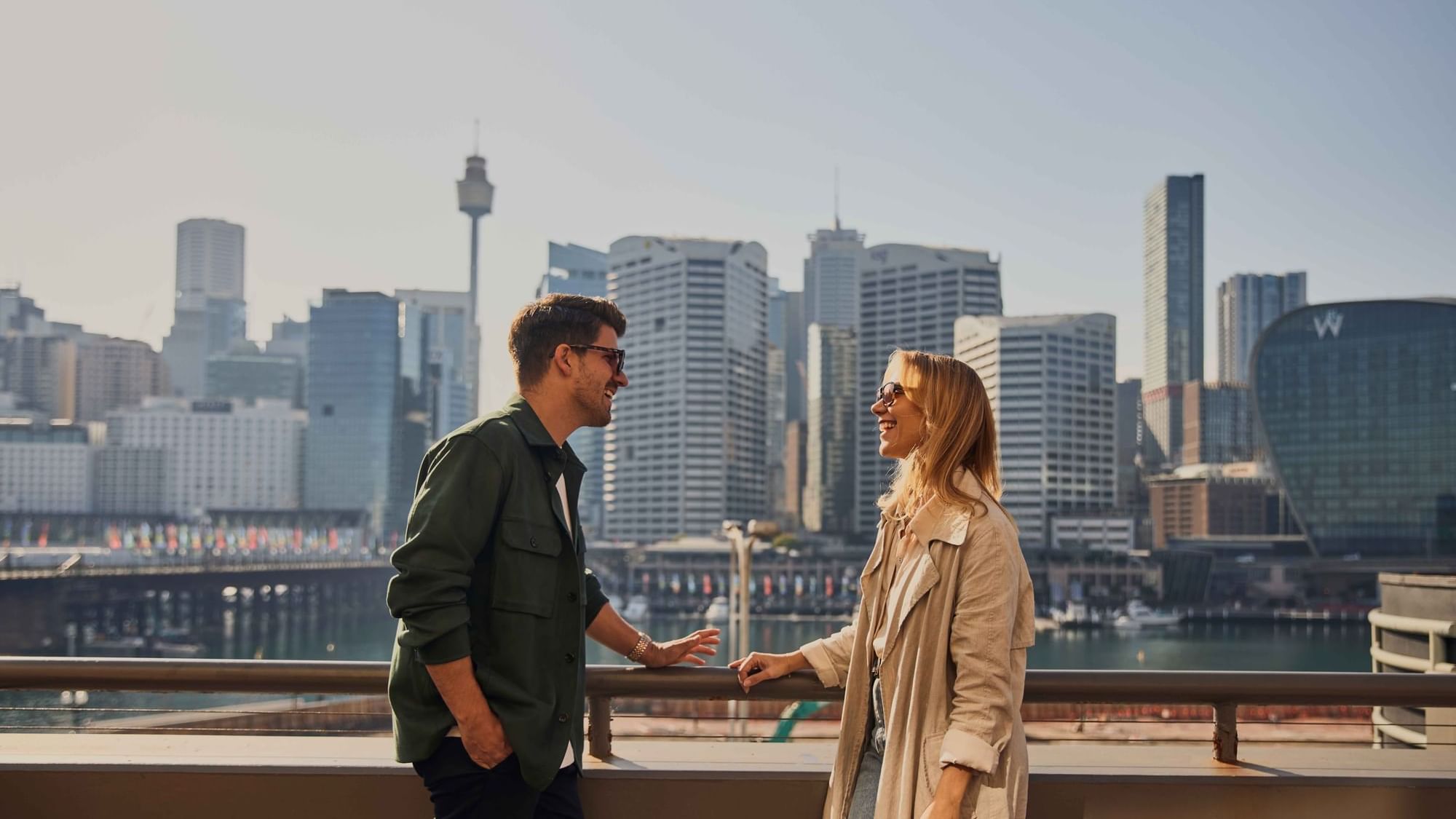 Couple enjoying sunset drinks on ibis bar deck