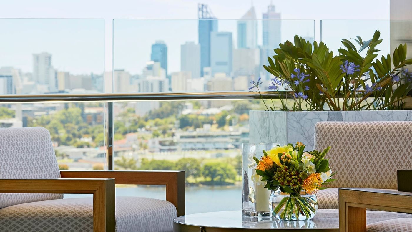 Living room with the city view at Crown Hotels