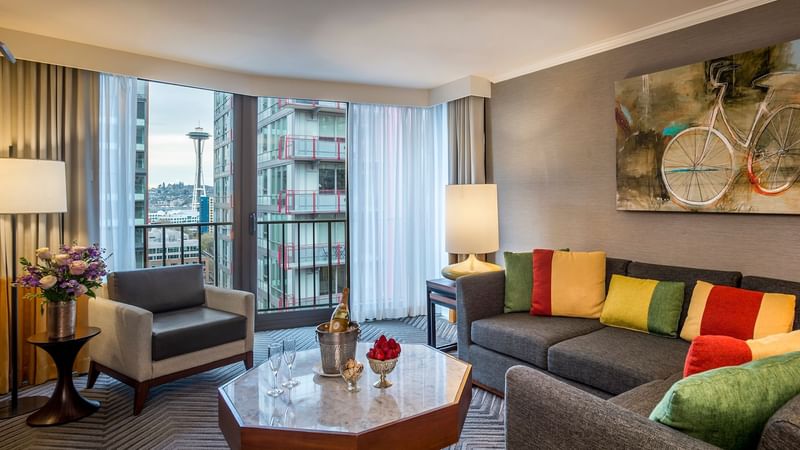 Living area with a balcony in Magnolia Suite at Warwick Seattle