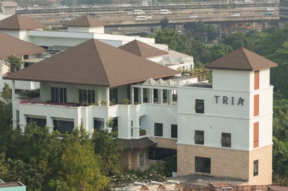 The exterior view of Tria building near Maitria Hotel Rama 9