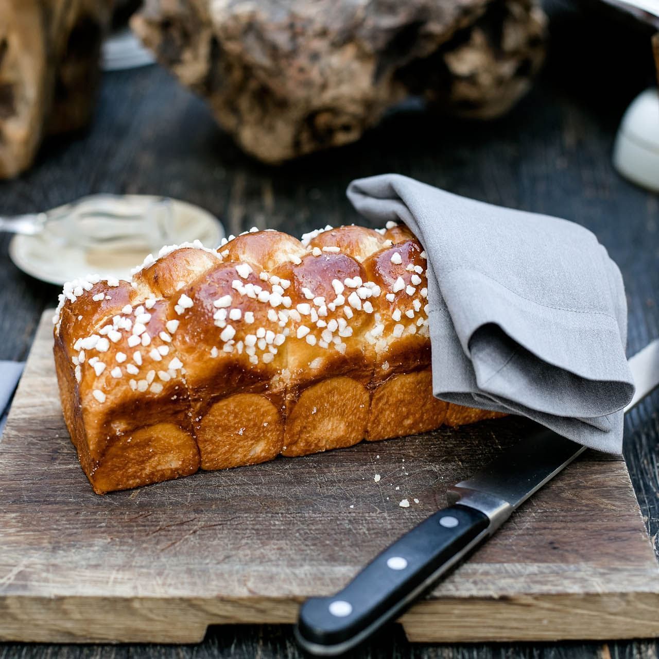 Challah on a cutting board in The Brunch, Domaine de Manville