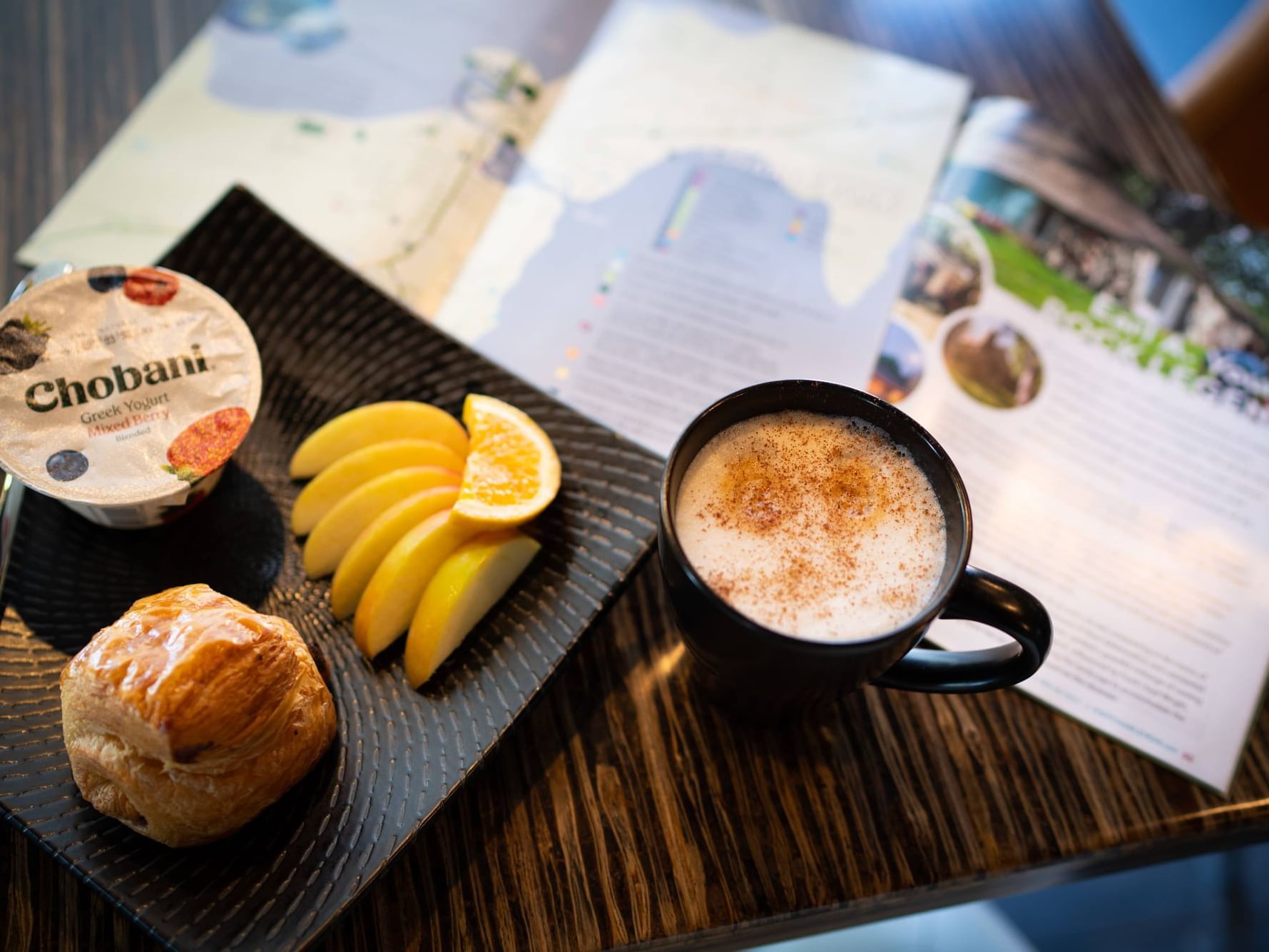 Pastry, fruits & yoghurt served with coffee in Continental Breakfast at The Earl