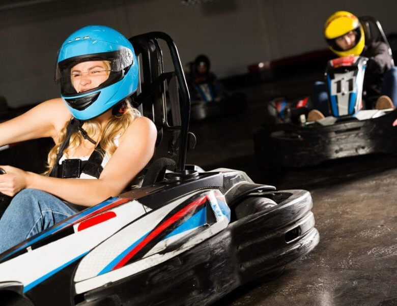 Lady enjoying the Andretti Indoor Karting near Lake Buena Vista Resort Village & Spa