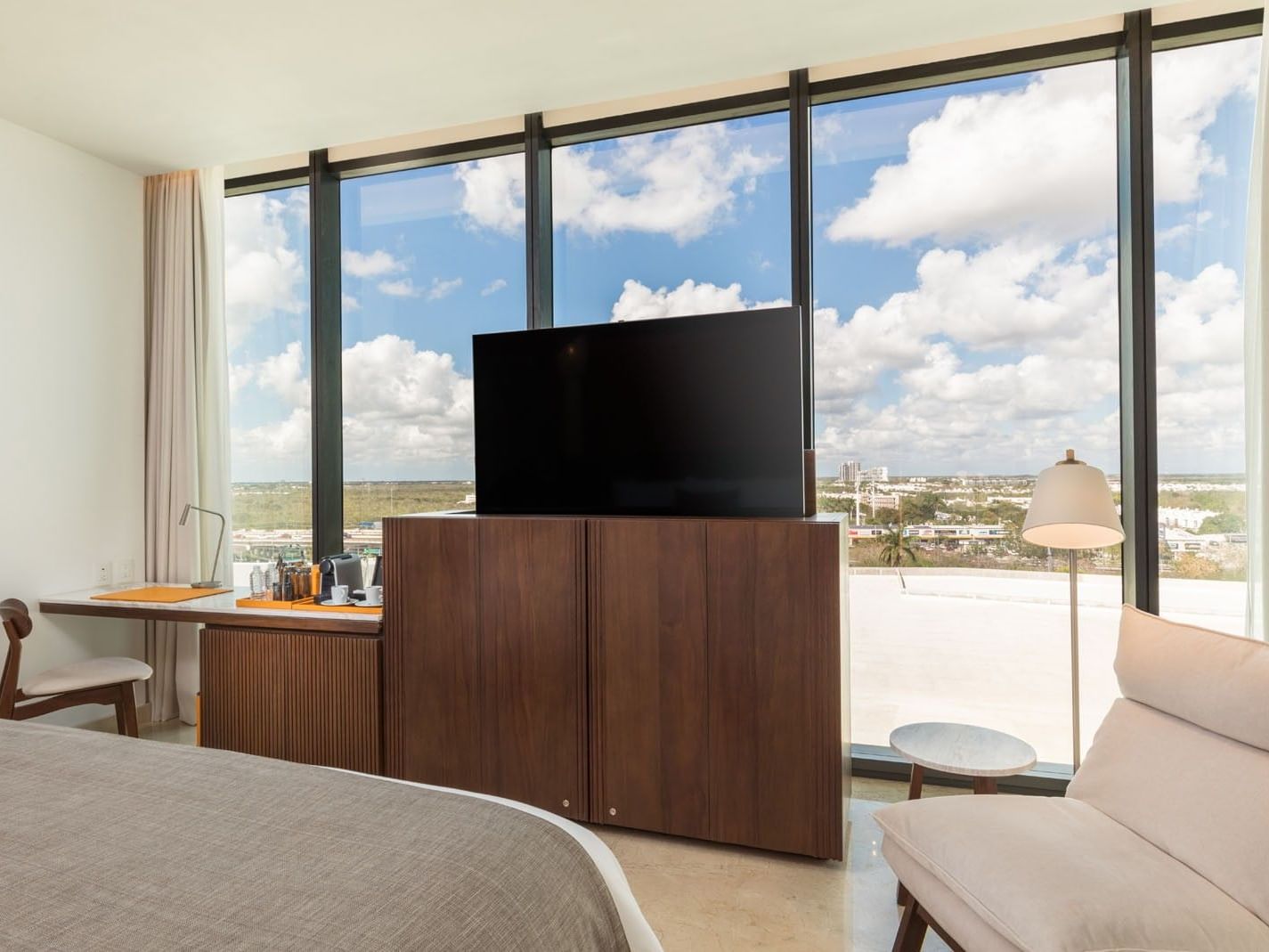 King Camino Real Club at Camino Real Merida featuring floor-to-ceiling windows with a beautiful skyline view