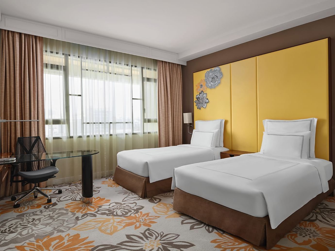 Executive Twin with cozy beds and working area at Paradox Singapore