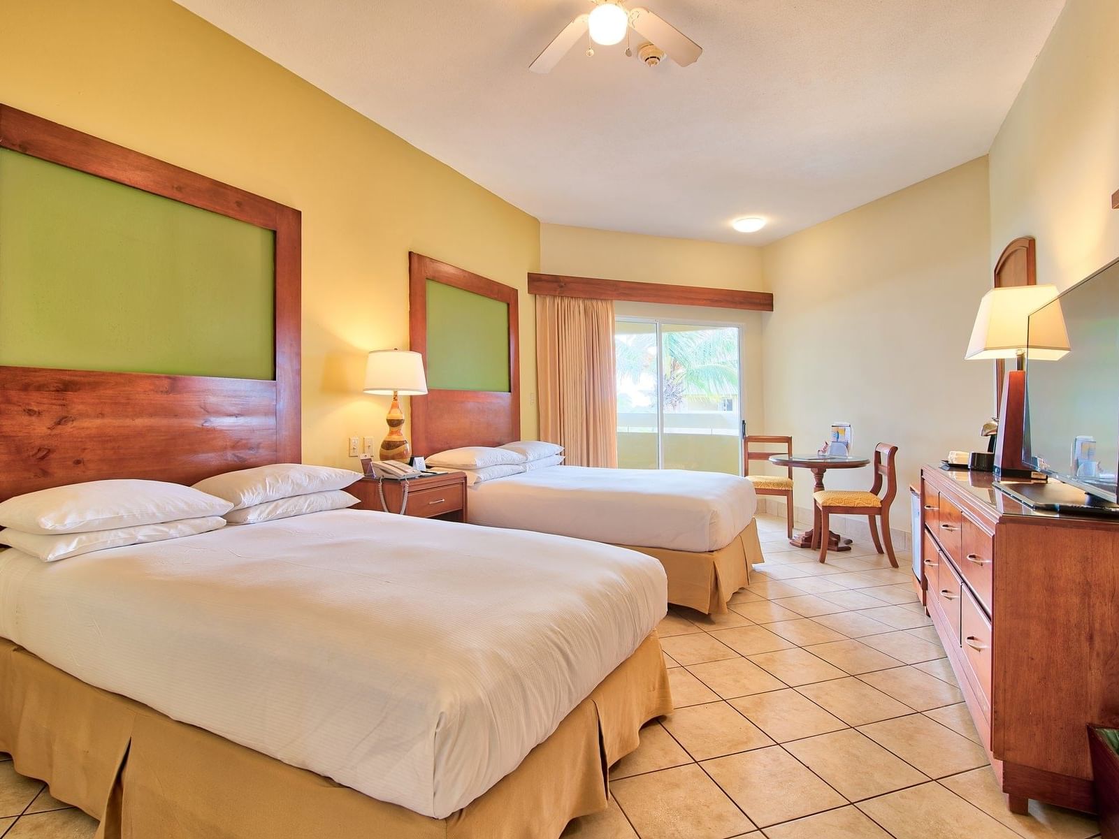 Royal ocean view 2 double bed with tv facility at Fiesta Resort 