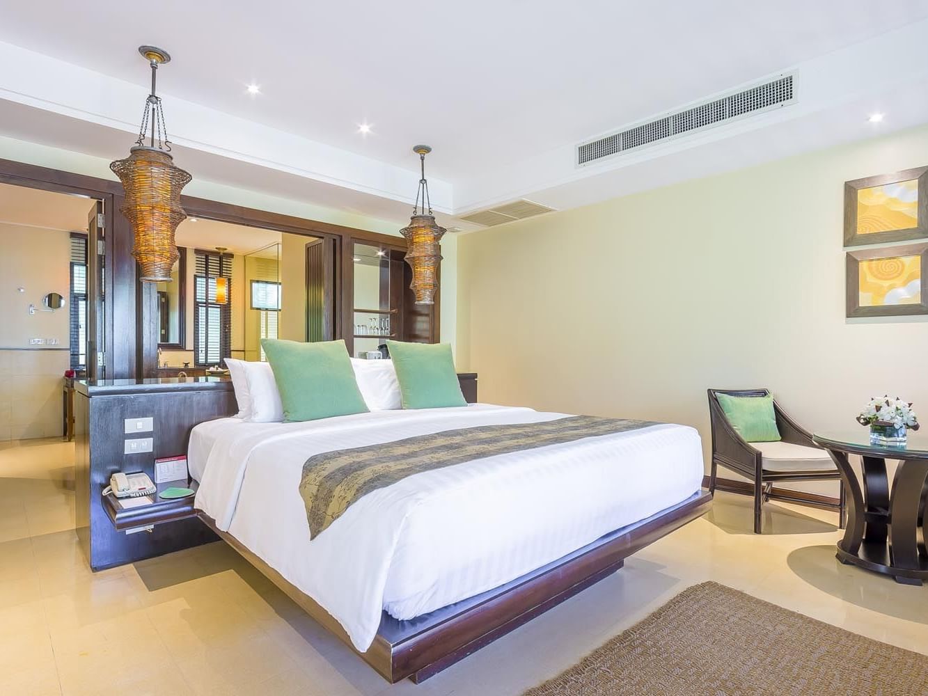 A cozy bed in a Plunge Pool Villa at Paradox Hotels & Resorts