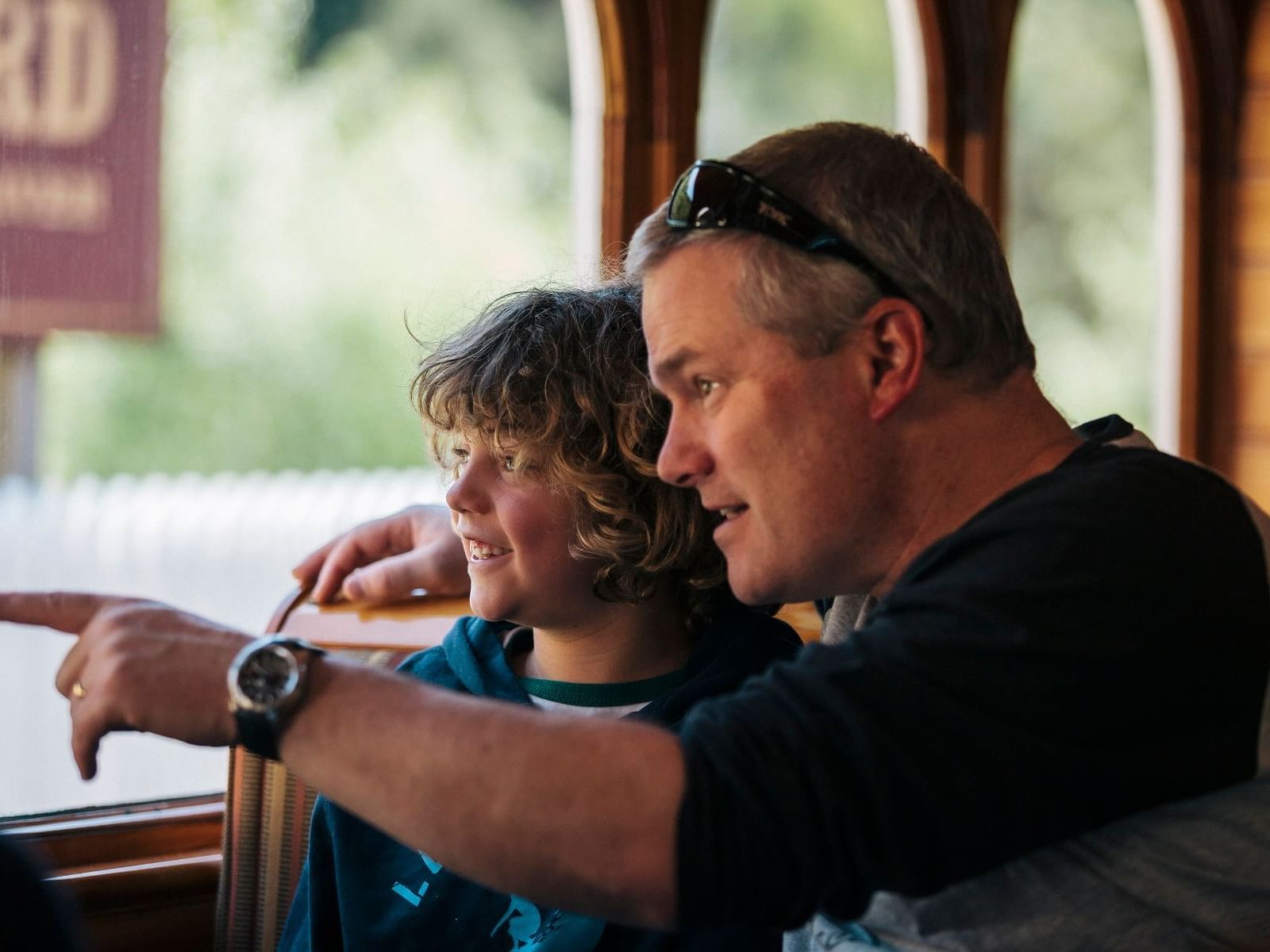 A father & a kid observing the surroundings at Strahan Village