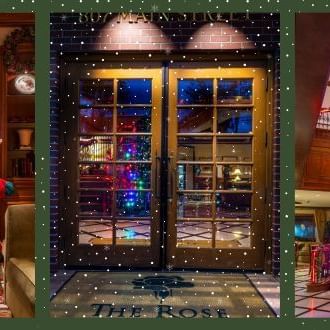 Festive lobby entrance adorned with decorations, lights, and a cozy fireplace scene, inviting guests into The Rose Hotel