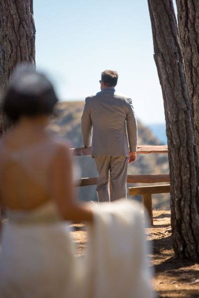 Bride approaching the groom outdoor at Heritage House Resort