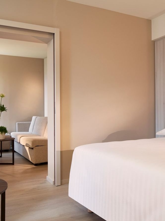 Comfy bed in a Suite at Oceania Clermont-Ferrand