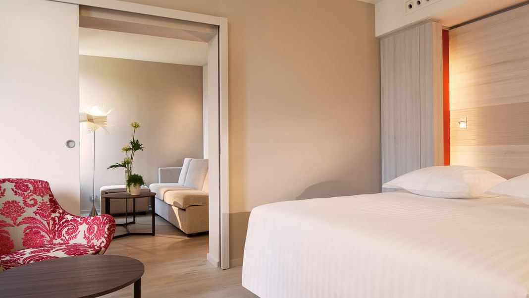 Comfy bed in a Suite at Oceania Clermont-Ferrand