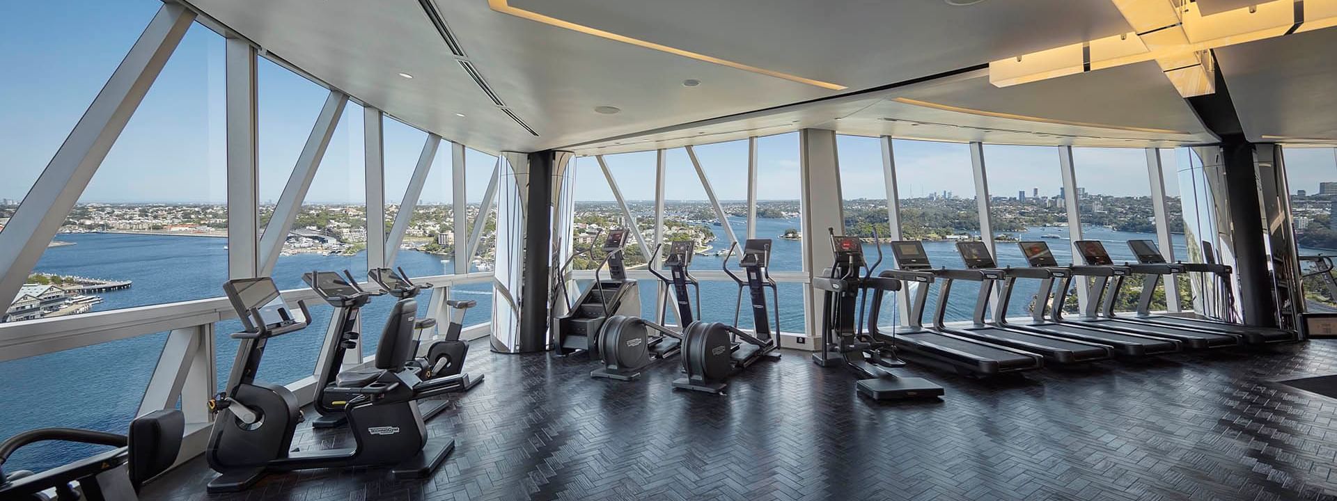Fitness center with city view at Crown Towers Sydney