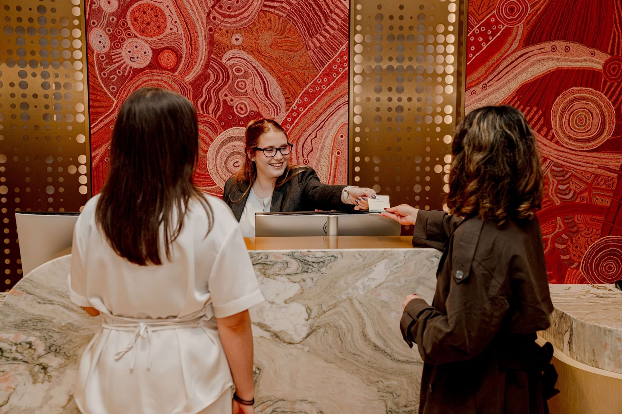 Amora team welcoming guests
