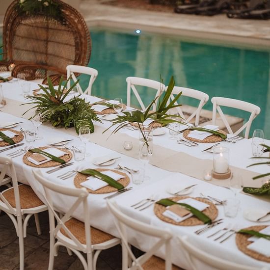 Table arranged by the pool, Pullman Palm Cove Sea Temple Resort