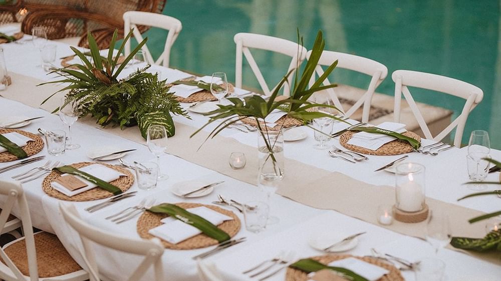 Table arranged by the pool, Pullman Palm Cove Sea Temple Resort